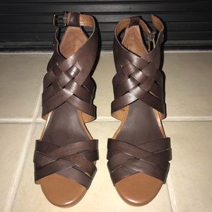 Brown buckled wedges
